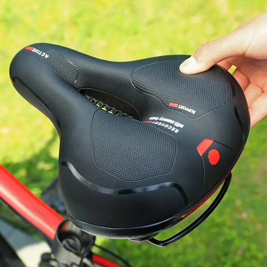 Wide, cushioned, and shock-absorbing bike saddle with memory foam and waterproof design – ensures ultimate comfort and support for every ride, whether on MTB, road, or indoor exercise bikes.